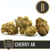 Kyle's Cherry AK strain buds, dense and filled with orange pistils.
