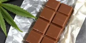 cannabis leaf on chocolate bar edible thc infused dessert